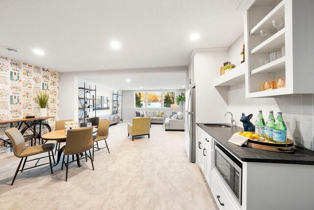 2712 Kensington Ave NE, Saint Michael, MN 55376 - dining space with light colored carpet and recessed lighting