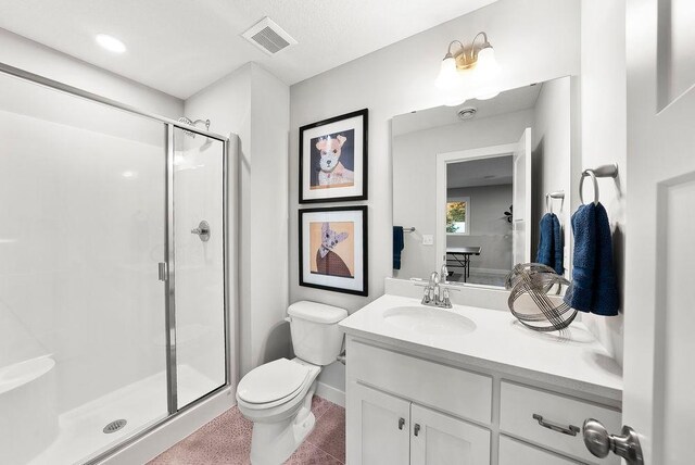 2712 Kensington Ave NE, Saint Michael, MN 55376 - full bathroom with toilet, a stall shower, baseboards, and vanity