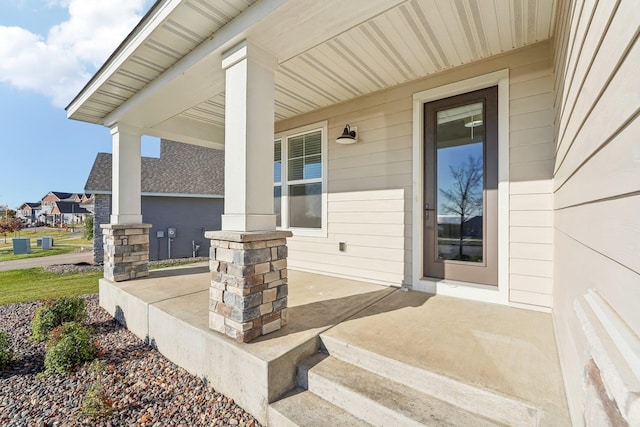doorway to property with a porch