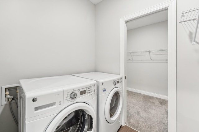 238 Jade Trl N, Lake Elmo, MN 55042 - laundry room with washing machine and clothes dryer, carpet floors, and baseboards