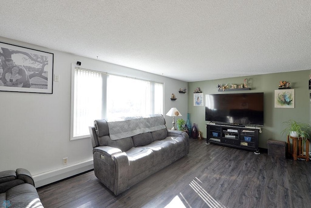 318 Morrison St, West Fargo, ND 58078 - living room featuring baseboards, a textured ceiling, baseboard heating, and dark wood finished floors
