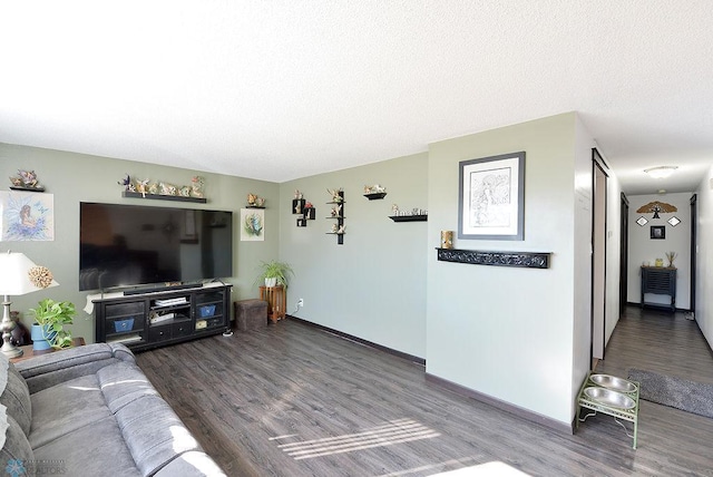 318 Morrison St, West Fargo, ND 58078 - living room featuring baseboards, wood finished floors, and a textured ceiling