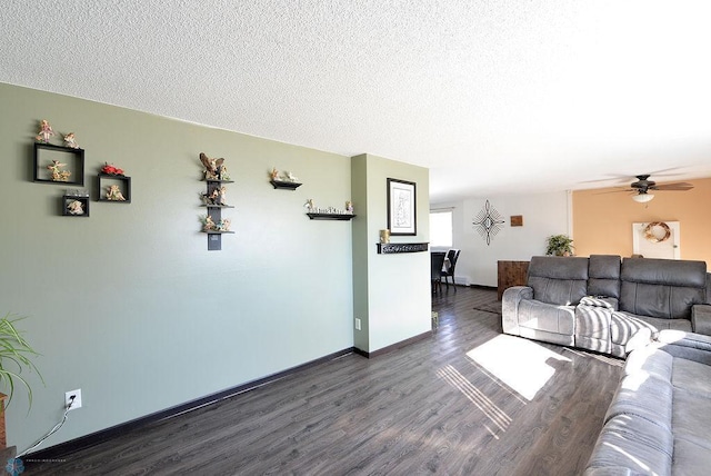 318 Morrison St, West Fargo, ND 58078 - living room with a textured ceiling, wood finished floors, ceiling fan, and baseboards