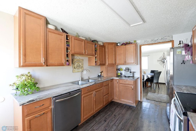 318 Morrison St, West Fargo, ND 58078 - kitchen featuring dark wood-type flooring, a textured ceiling, open shelves, appliances with stainless steel finishes, and a sink