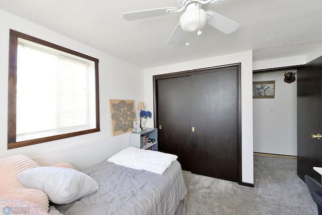 318 Morrison St, West Fargo, ND 58078 - carpeted bedroom featuring a closet and ceiling fan