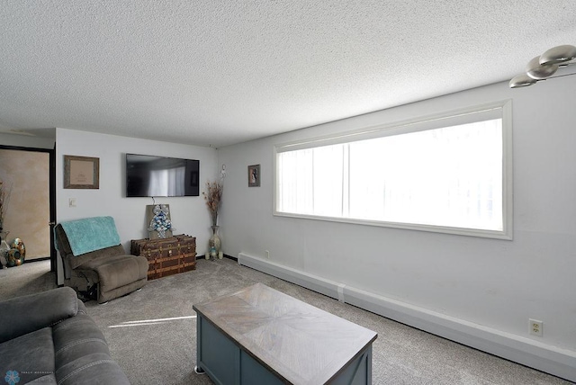 318 Morrison St, West Fargo, ND 58078 - carpeted living room with baseboard heating and a textured ceiling