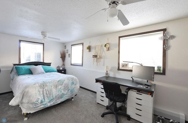 318 Morrison St, West Fargo, ND 58078 - carpeted bedroom featuring a textured ceiling, baseboards, and a ceiling fan