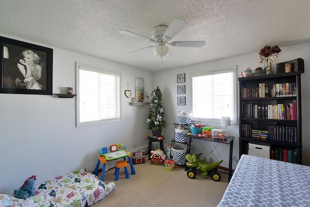 318 Morrison St, West Fargo, ND 58078 - carpeted bedroom with a ceiling fan and a textured ceiling