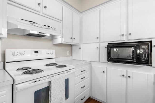 kitchen featuring white electric stove, black microwave, light countertops, under cabinet range hood, and white cabinets