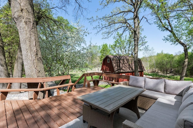 wooden deck with outdoor lounge area
