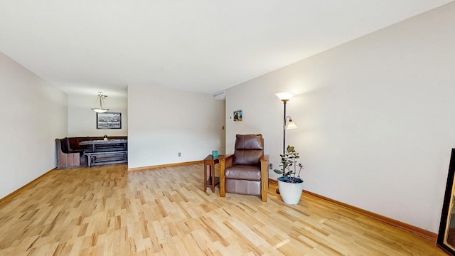 450 Ford Rd Unit 217, Saint Louis Park, MN 55426 - living area with light wood-style flooring and baseboards