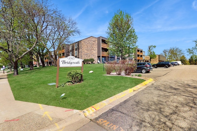 450 Ford Rd Unit 217, Saint Louis Park, MN 55426 - view of building exterior with uncovered parking