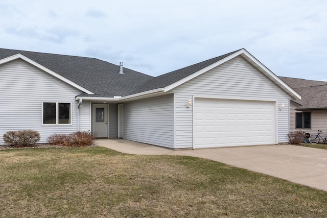 930 5th Ave, Goodhue, MN 55027 - ranch-style home featuring a front yard, driveway, a shingled roof, and a garage