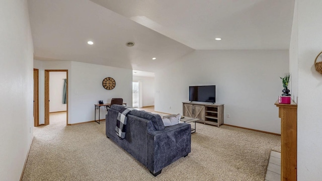 930 5th Ave, Goodhue, MN 55027 - living area featuring baseboards, visible vents, light colored carpet, and vaulted ceiling