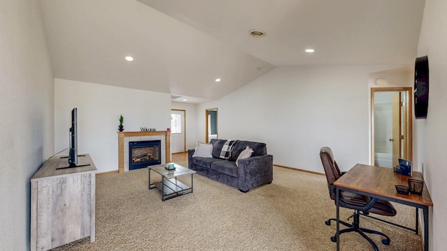 930 5th Ave, Goodhue, MN 55027 - carpeted living area with visible vents, baseboards, recessed lighting, vaulted ceiling, and a tile fireplace