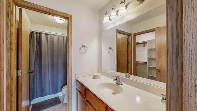 930 5th Ave, Goodhue, MN 55027 - bathroom with tile patterned floors, curtained shower, vanity, and toilet