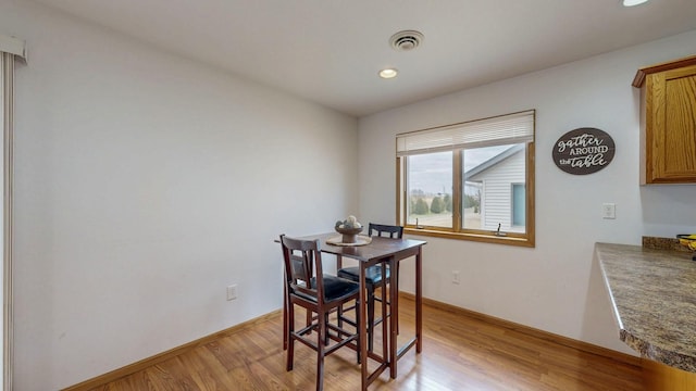 930 5th Ave, Goodhue, MN 55027 - dining area featuring visible vents, baseboards, recessed lighting, and light wood-style floors