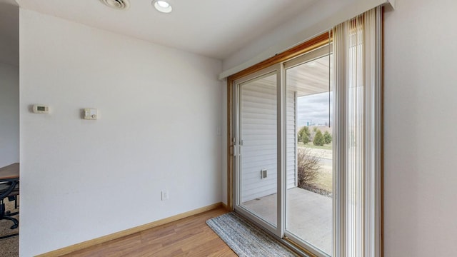 930 5th Ave, Goodhue, MN 55027 - interior space with light wood-style floors and baseboards