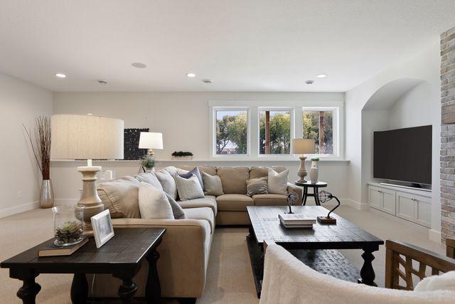4036 Arbor Dr, Woodbury, MN 55129 - carpeted living room with recessed lighting and baseboards