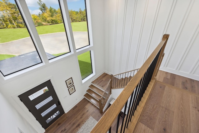 foyer featuring wood finished floors