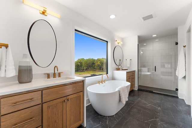 bathroom with a sink, marble finish floor, two vanities, visible vents, and a stall shower