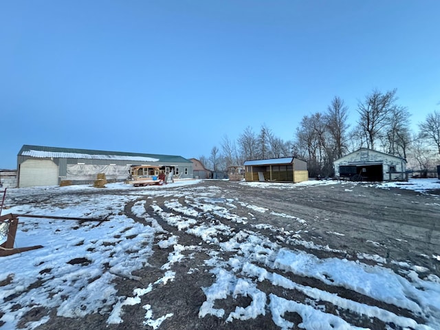 exterior space featuring an outbuilding and a storage unit