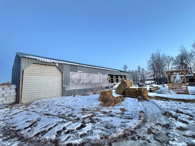 exterior space with an outbuilding