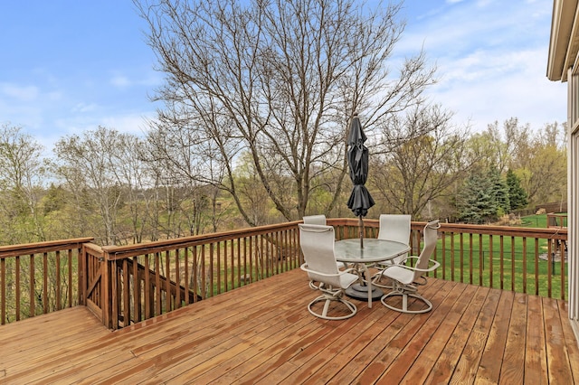 deck with outdoor dining space