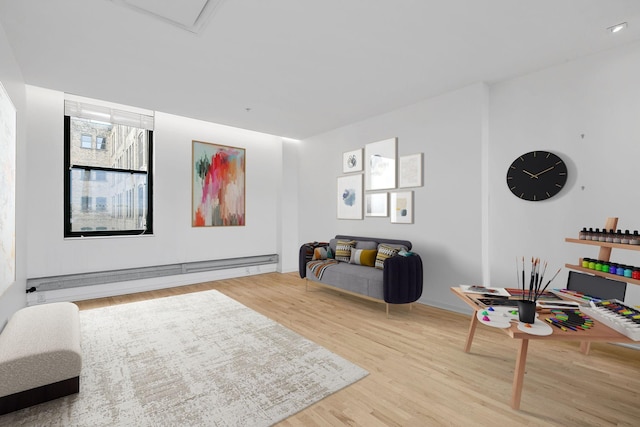 290 Market St Unit 314, Minneapolis, MN 55405 - living room with wood finished floors and a baseboard heating unit
