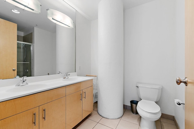 290 Market St Unit 314, Minneapolis, MN 55405 - bathroom with toilet, double vanity, a sink, and a shower stall