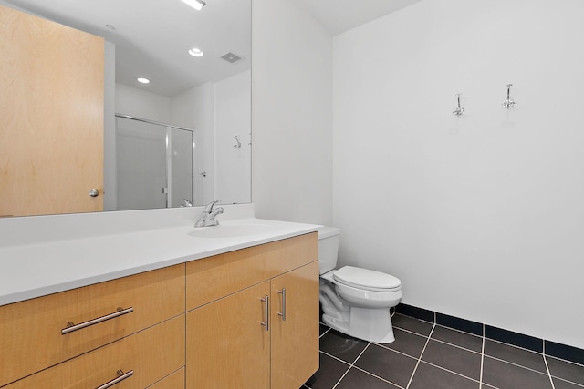 290 Market St Unit 314, Minneapolis, MN 55405 - full bath featuring toilet, vanity, recessed lighting, a shower with door, and tile patterned flooring