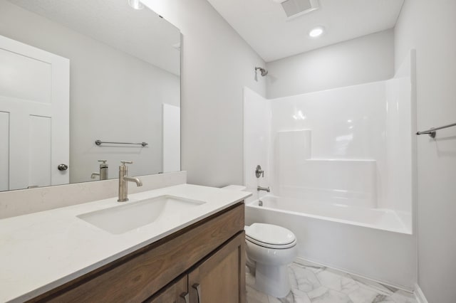 full bathroom with visible vents, toilet, tub / shower combination, vanity, and marble finish floor