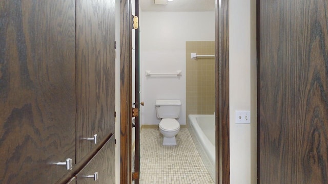 2495 Canabury Dr Unit 125, Little Canada, MN 55117 - bathroom featuring toilet, tile patterned floors, and baseboards