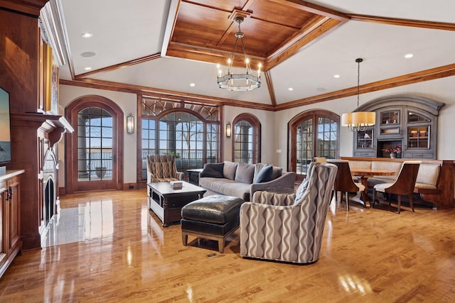 6425 Virginia Dr, Victoria, MN 55331 - living room with light wood finished floors, healthy amount of natural light, arched walkways, a chandelier, and ornamental molding