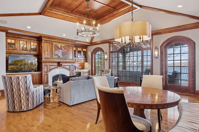 6425 Virginia Dr, Victoria, MN 55331 - dining area with a chandelier, light wood finished floors, wooden ceiling, a lit fireplace, and recessed lighting