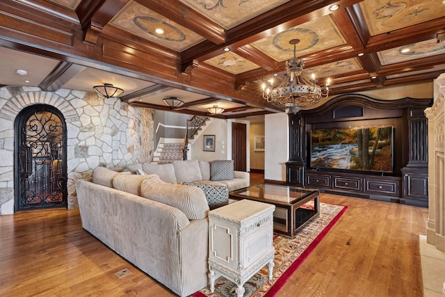 6425 Virginia Dr, Victoria, MN 55331 - living area featuring stairway, a chandelier, coffered ceiling, wood finished floors, and beamed ceiling
