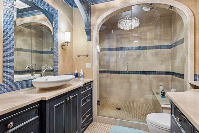 6425 Virginia Dr, Victoria, MN 55331 - full bath featuring vanity, a shower stall, a chandelier, and decorative backsplash