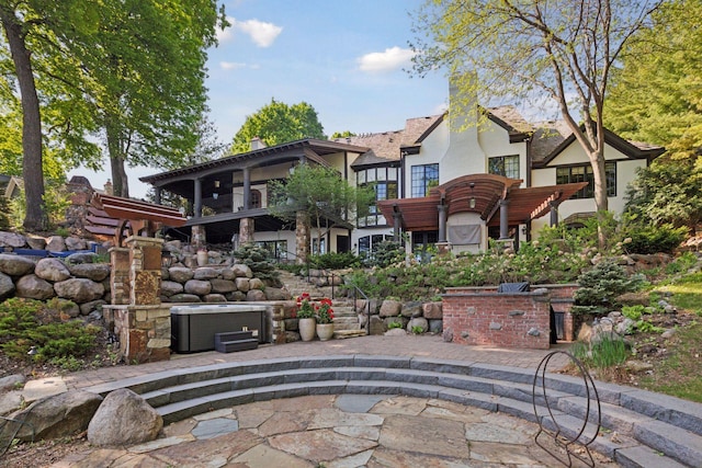 6425 Virginia Dr, Victoria, MN 55331 - view of community with a hot tub and a patio