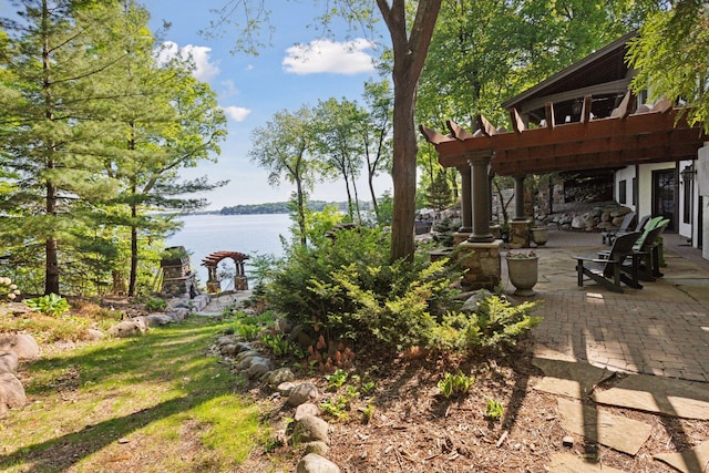 6425 Virginia Dr, Victoria, MN 55331 - view of yard featuring a patio and a water view