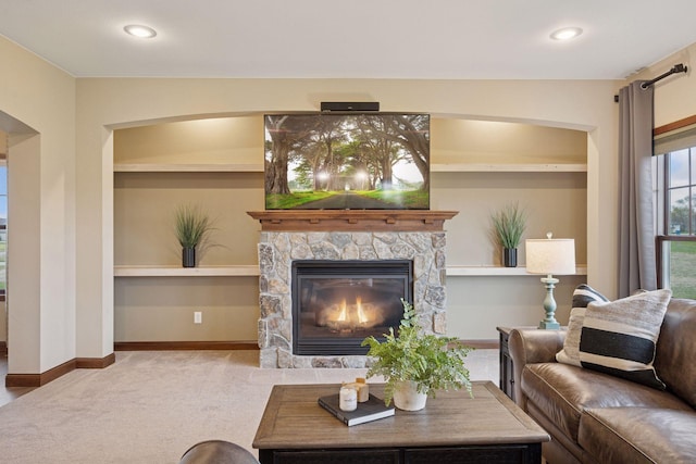 21804 Majestic Dr, Saint Augusta, MN 55320 - living room featuring baseboards, a fireplace, and carpet flooring