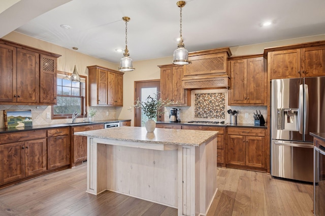 21804 Majestic Dr, Saint Augusta, MN 55320 - kitchen with a sink, appliances with stainless steel finishes, light wood-type flooring, and a healthy amount of sunlight