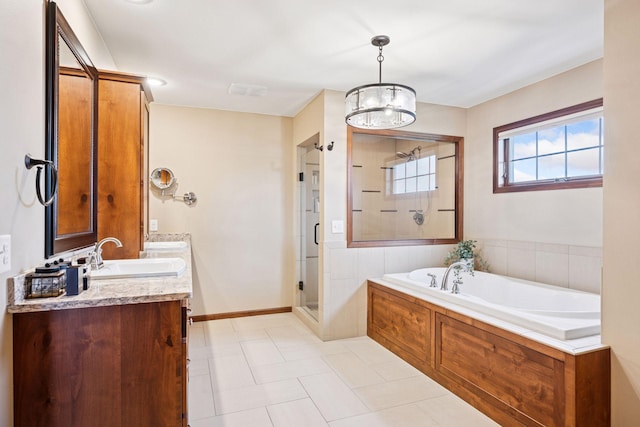21804 Majestic Dr, Saint Augusta, MN 55320 - full bathroom featuring a garden tub, a shower stall, vanity, tile patterned floors, and a notable chandelier