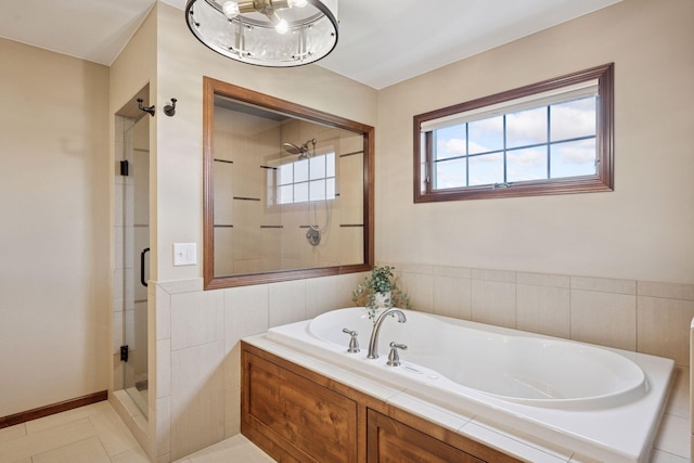 21804 Majestic Dr, Saint Augusta, MN 55320 - full bathroom with tile patterned floors, a shower stall, and a garden tub