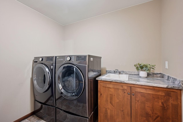 21804 Majestic Dr, Saint Augusta, MN 55320 - laundry room with baseboards, a sink, cabinet space, and independent washer and dryer