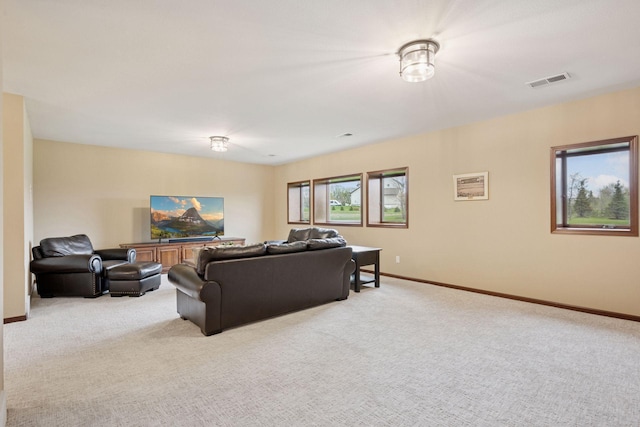 21804 Majestic Dr, Saint Augusta, MN 55320 - living room with light colored carpet, baseboards, and visible vents