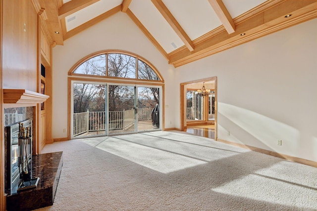 4 Antrim Ter, Edina, MN 55439 - unfurnished living room with an inviting chandelier, a fireplace, carpet flooring, beam ceiling, and high vaulted ceiling