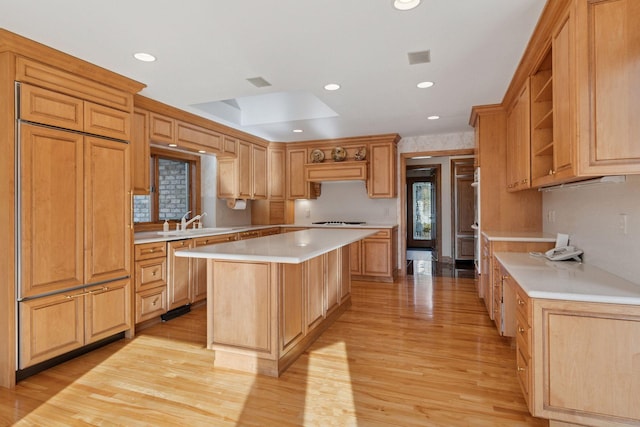 4 Antrim Ter, Edina, MN 55439 - kitchen featuring open shelves, a kitchen island, dishwasher, a sink, and light countertops