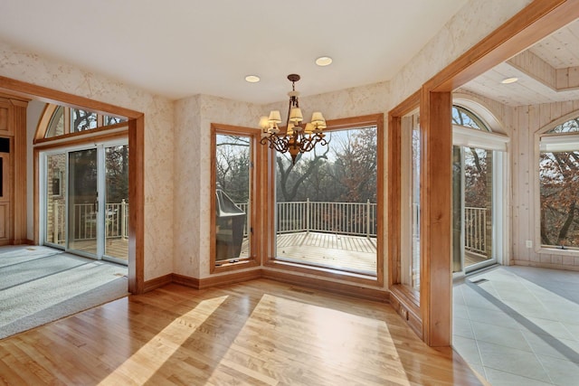4 Antrim Ter, Edina, MN 55439 - interior space with light wood-type flooring, a healthy amount of sunlight, an inviting chandelier, and visible vents
