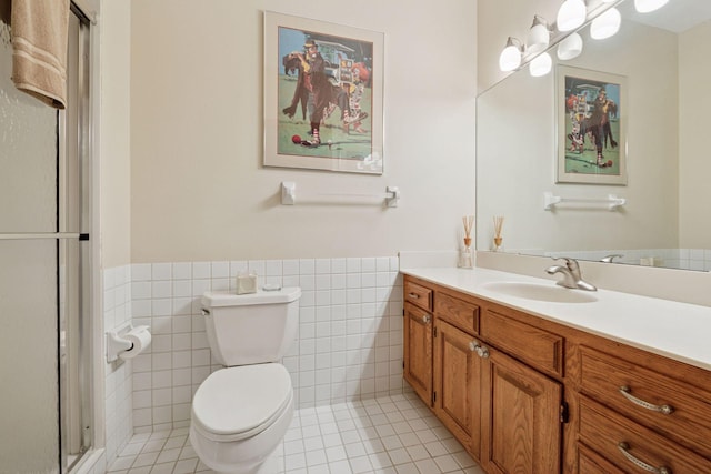 4 Antrim Ter, Edina, MN 55439 - bathroom featuring tile patterned flooring, vanity, tile walls, and toilet