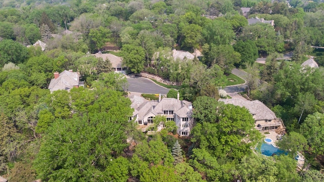 4 Antrim Ter, Edina, MN 55439 - drone / aerial view featuring a wooded view